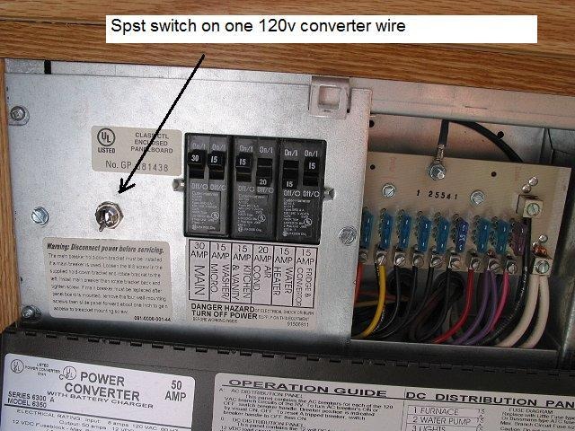 Letter D in the schematic diagram is this spst switch. I drilled a hole in the metal plate. It switches one of the converter's 120v feed wires.