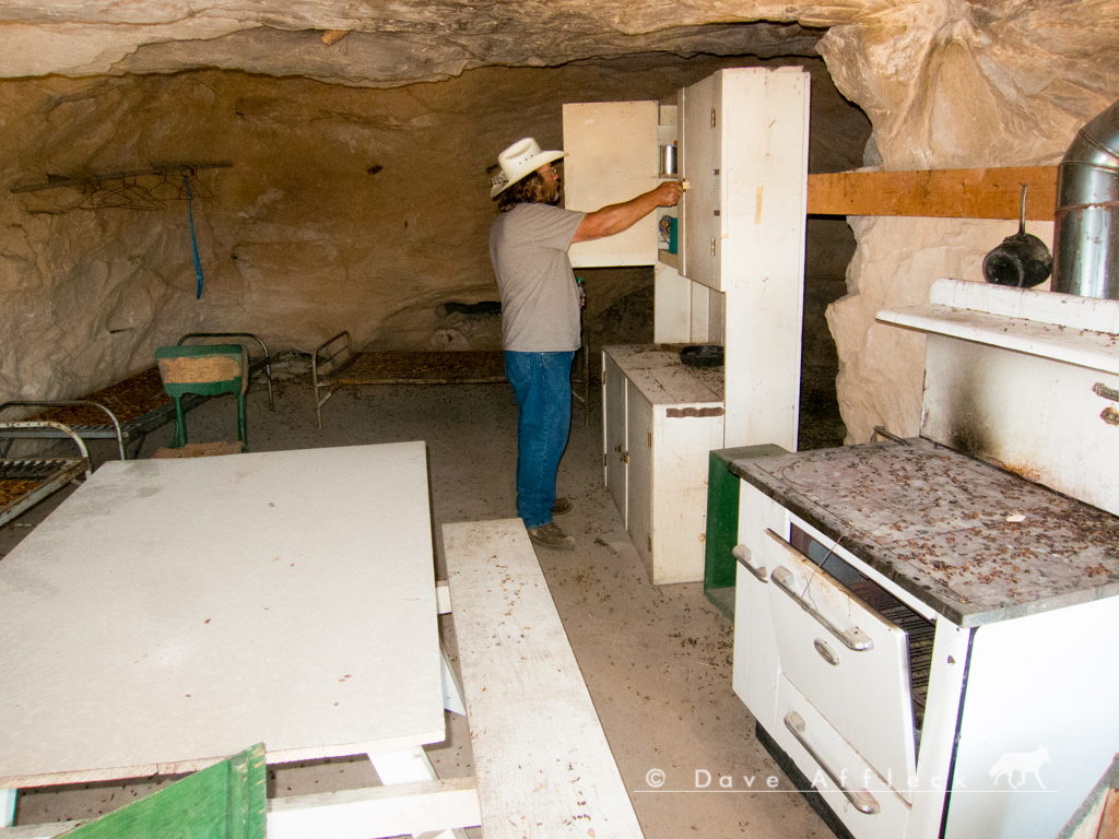 Interior of cabin with natural rock walls