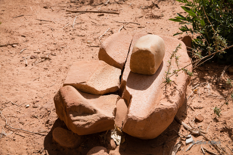 Broken mano and metate