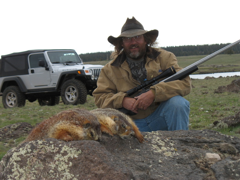 Tim with two rock chucks taken at 605 yards with .20 Dasher