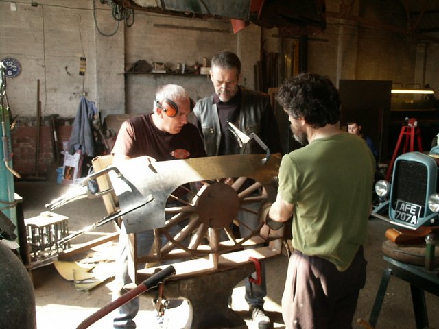Ben, Emile, and Neil fitting an A-35 PU fender at UK MetalMeet 2007
