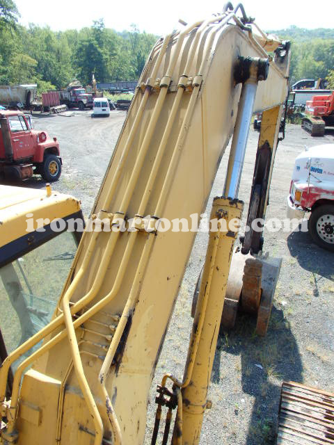 excavator with grapple