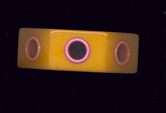 Bakelite%20Butterscotch%20Bangle%20with%20Plastic%20Cutouts.jpg