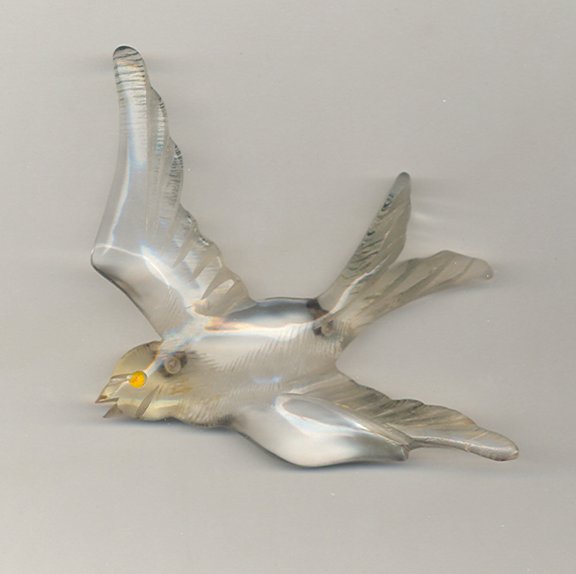 Lucite%20Reverse%20Carved%20Bird.jpg