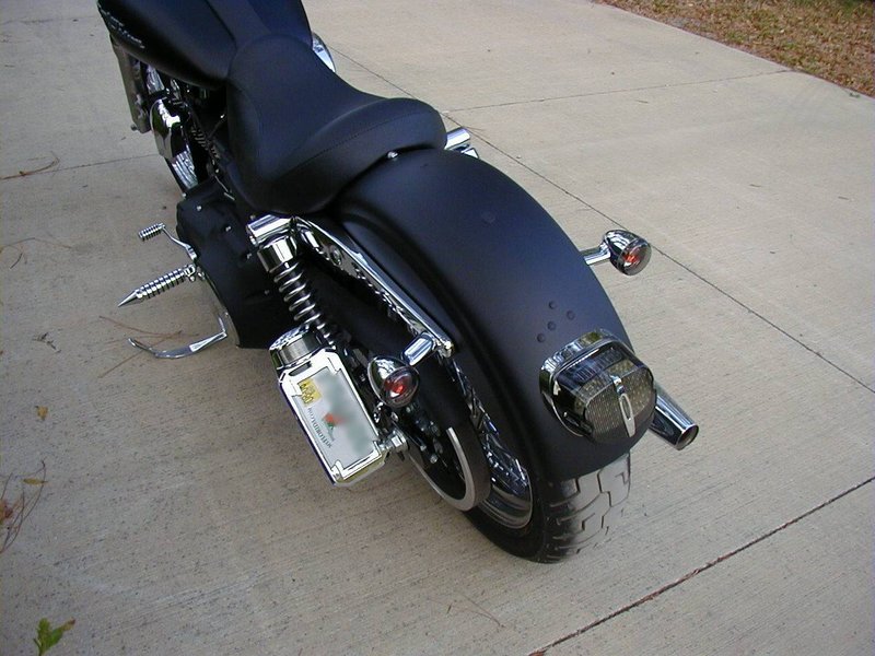 Side mounted license plate for Dyna bikes