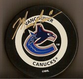 REGULAR HAND SIGNED PUCKS AND BASEBALLS