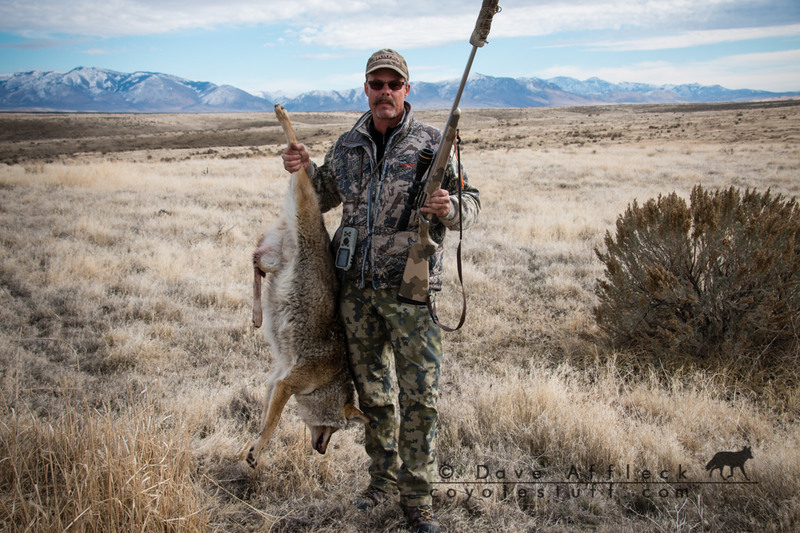 Me with big male coyote and suppressed .17 Predator