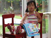2006-06-12  Kacey reading books