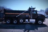 Cat CT660L Steerable Drop Tri Axle