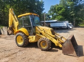New Holland 555E Rubber Tire Backhoe