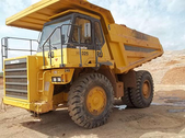 Two Komatsu HD325-6 Trucks