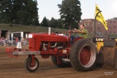IH-M pulling Tractor