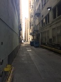 EXT/ L.A. ALLEY