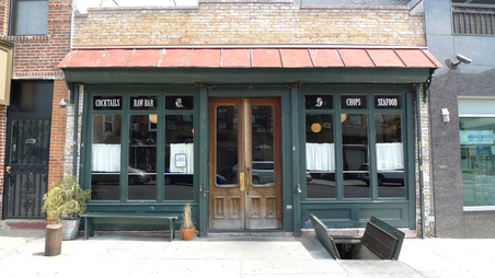 INT. NYC RESTAURANT/CAFE