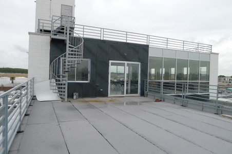 EXT. GIG'S ROOFTOP