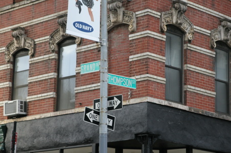 Thompson st. b/t Grand & 6th ave. 