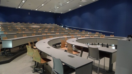 INT. SUMMER'S OFFICE & I/E LECTURE HALL