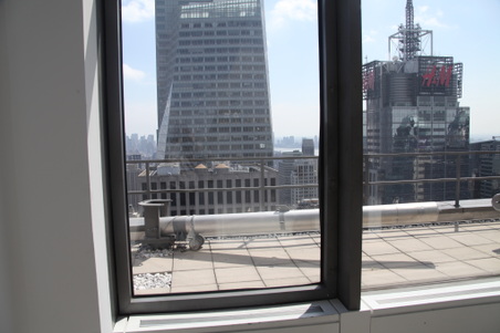 EXT. BUILDING #3 (ROOF)